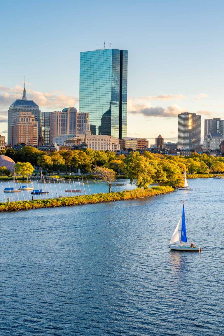 Sailboats on the Charles River with the Boston skyline in the background, taken from Longfellow Bridge in the late afternoon light.
